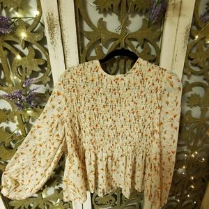 A beautiful flowy long sleeve blouse